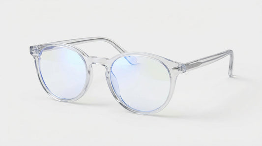 lunettes anti lumière bleue transparentes reflet bleu sur bureau avec écran ordinateur